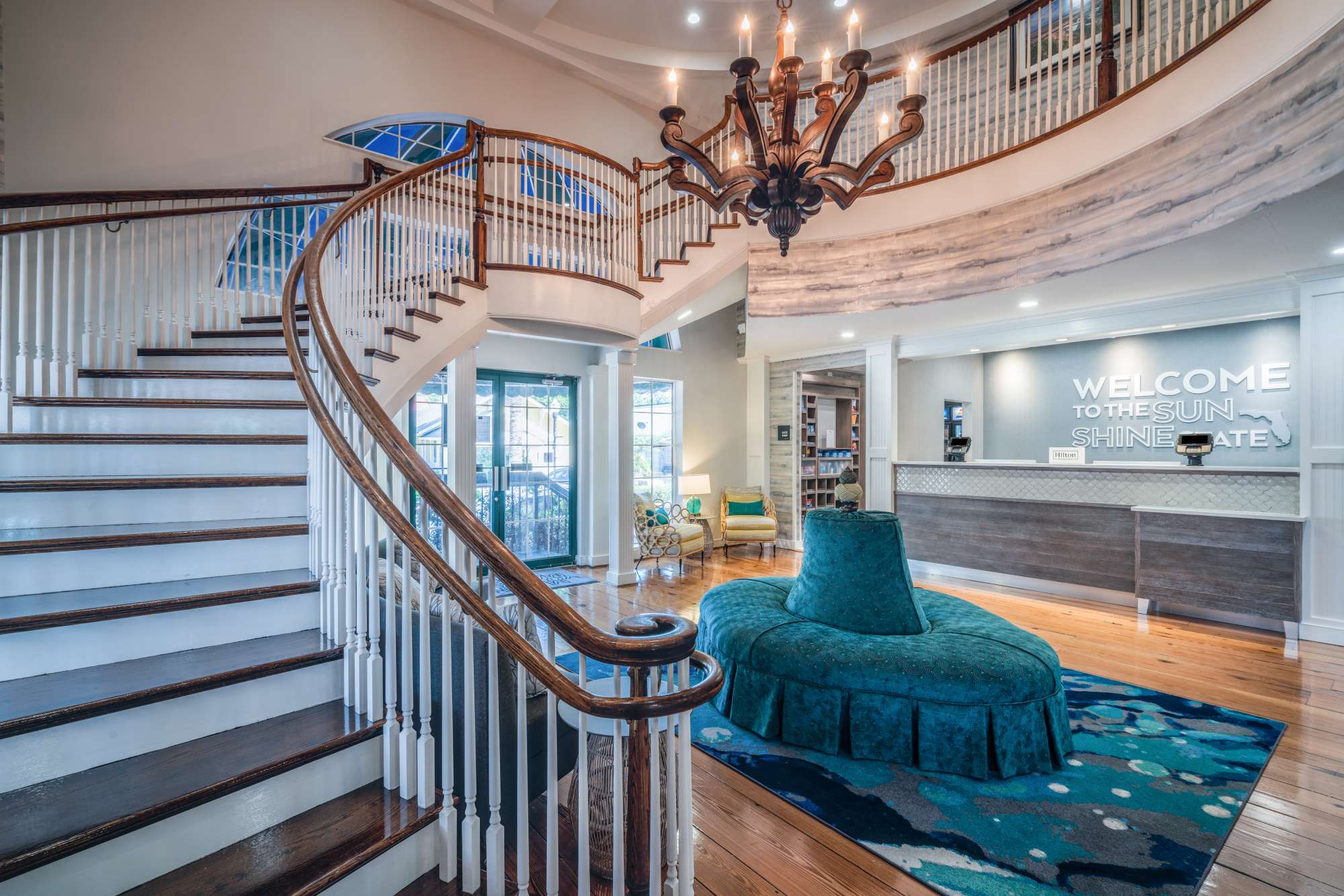 Lobby and staircase at the Hampton Inn Harbor Front Amelia Island