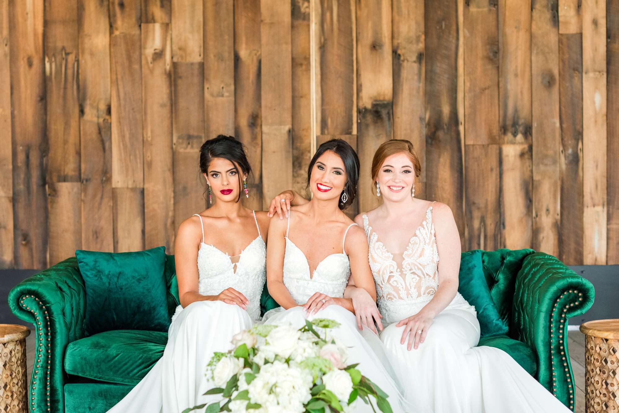 brides against the rustic wood wall at St Johns Golf and country club