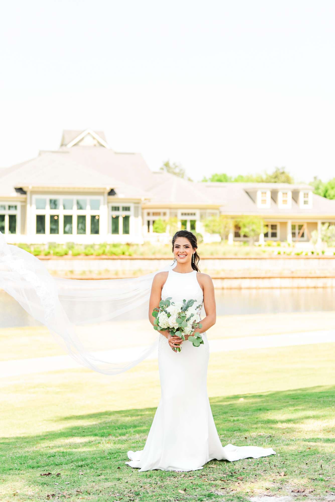 bride with St Johns Golf and Country Club in the background