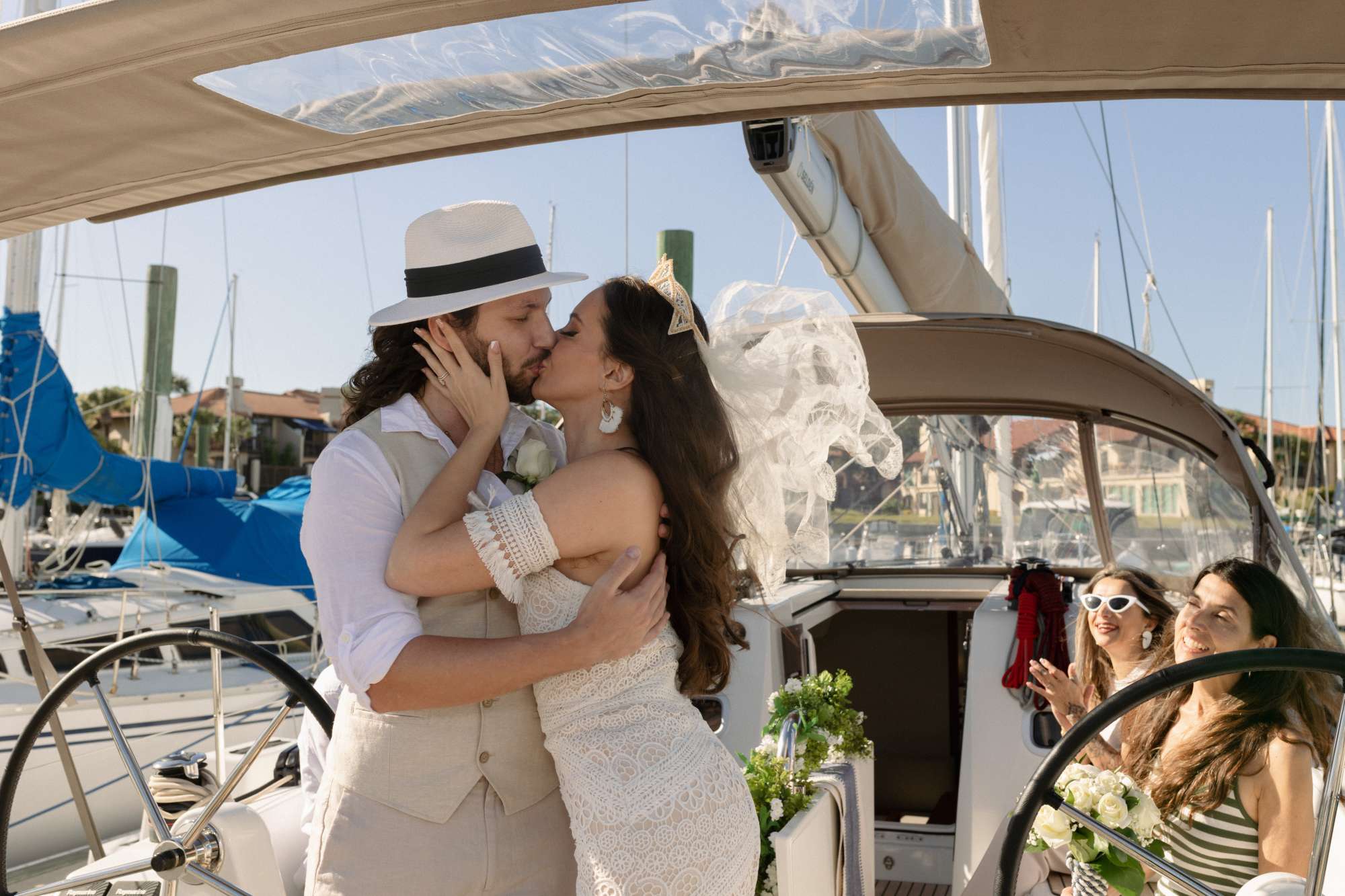 First Kiss as husband and wife on a sailboat St. Augustine