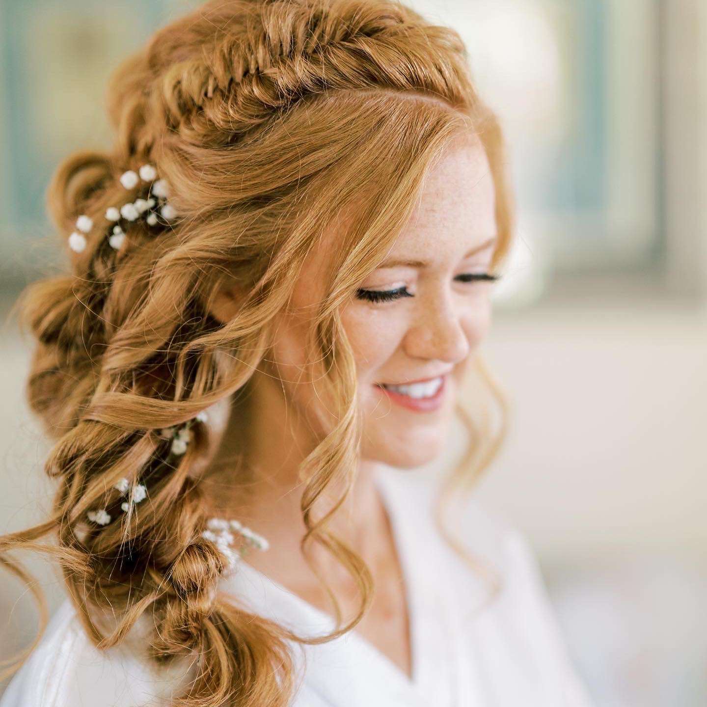 long braided brides wedding hair with babys breath Curl Wink Blush