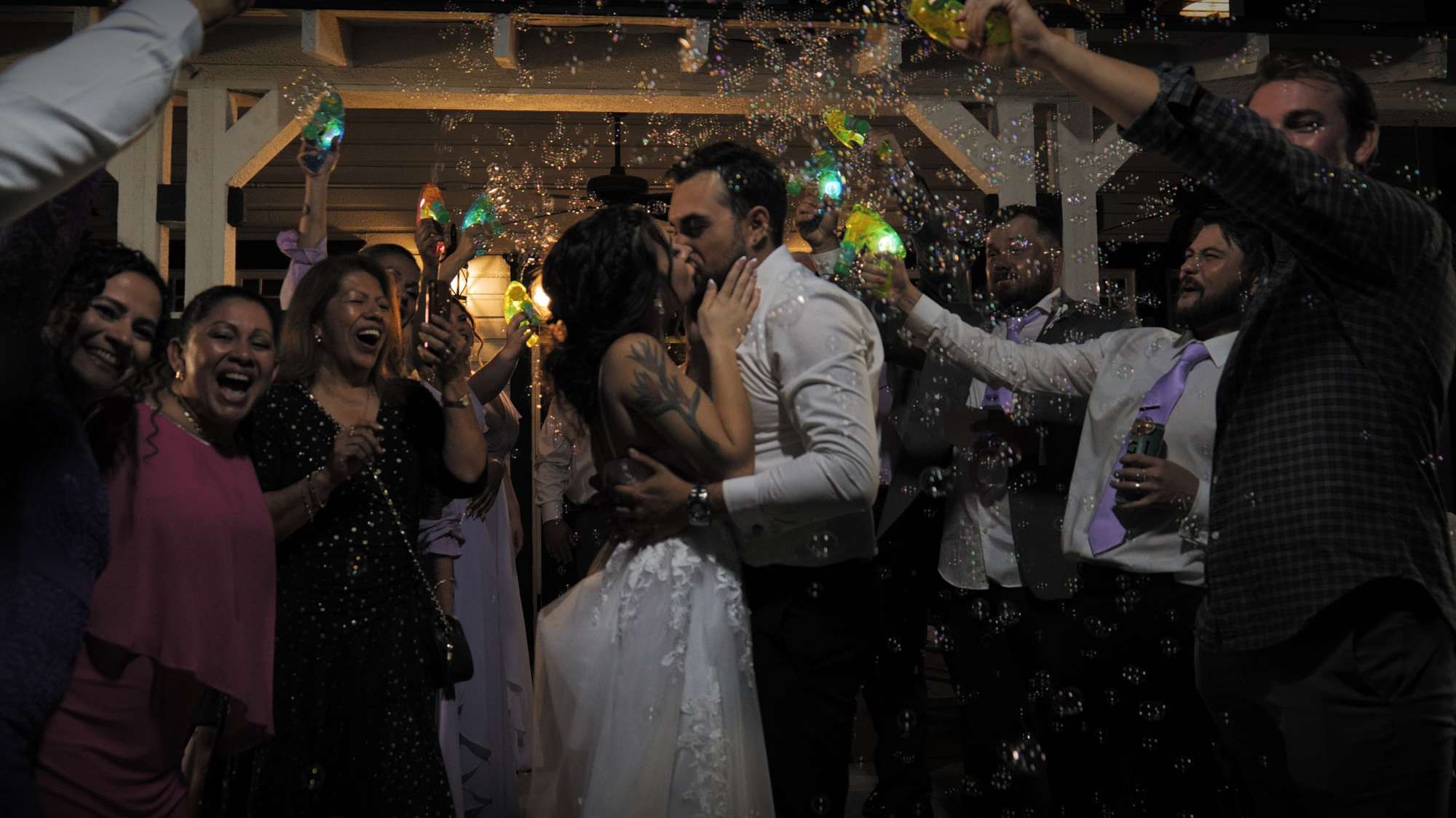 bride and groom kissing with Estory Video and Premier Bride 904