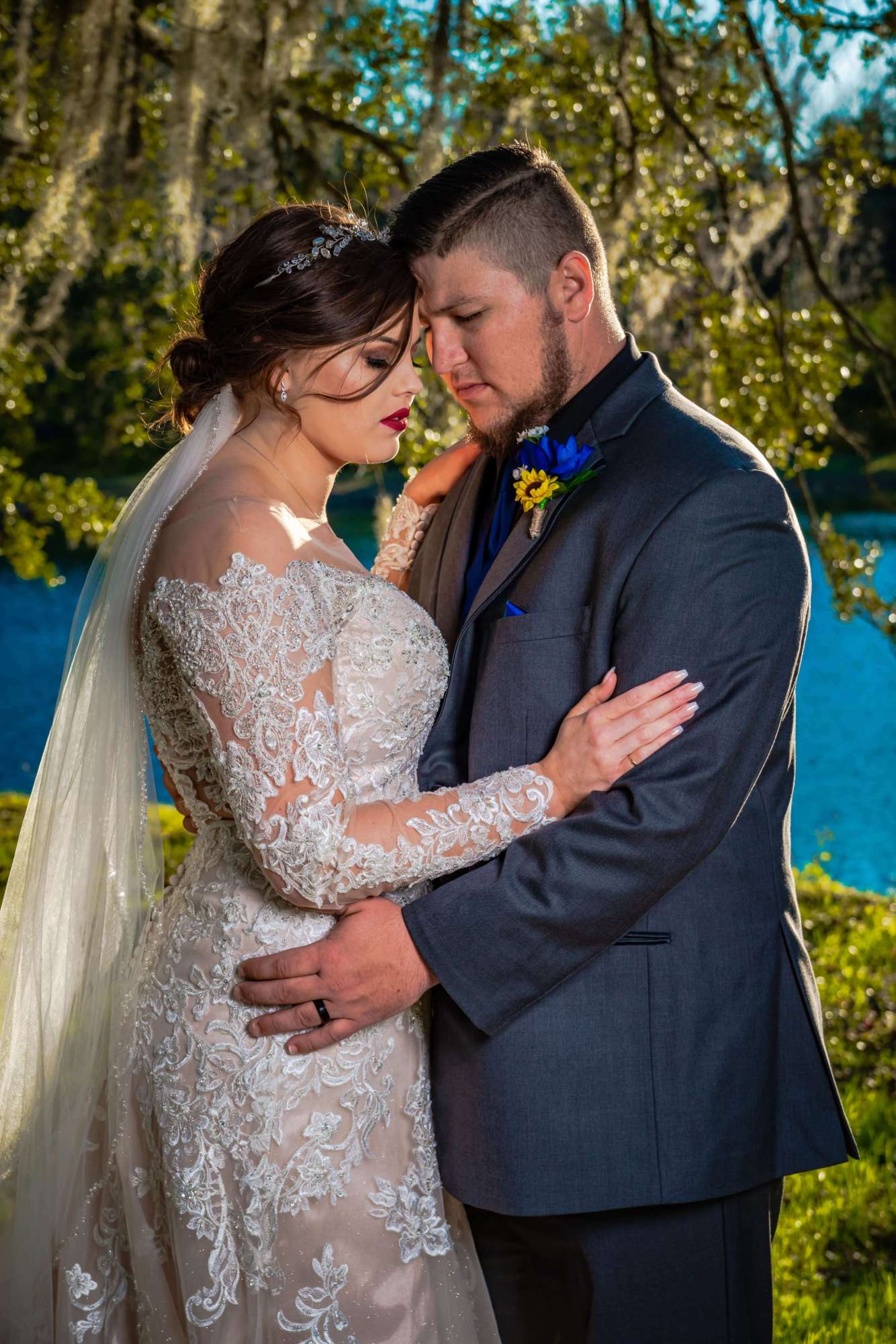 Bride and groom with portraits - Breathless Imagery - Premier Bride of Jacksonville