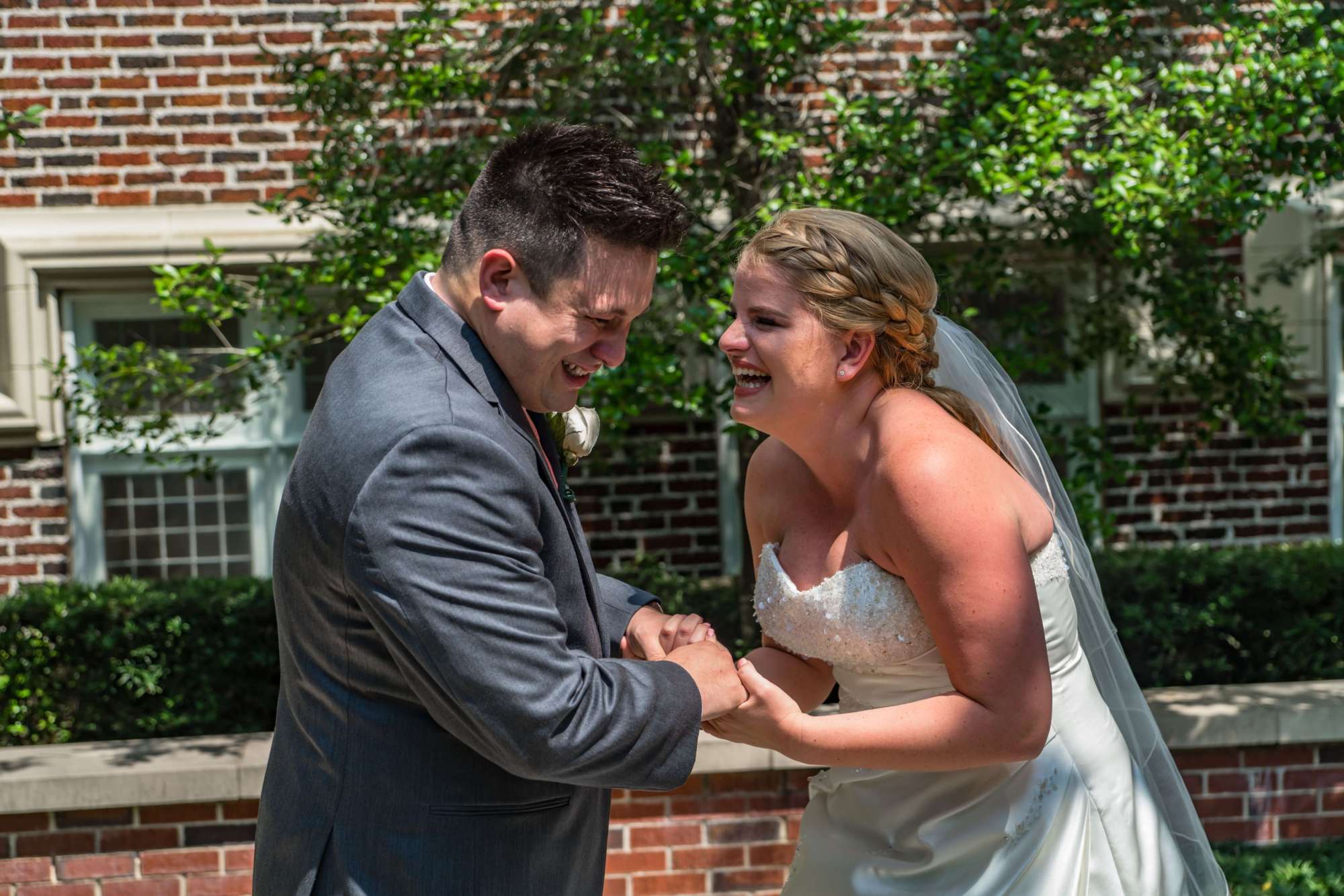 Bride and groom laughing at first look. Breathless Imagery and Premier Bride of Jacksonville