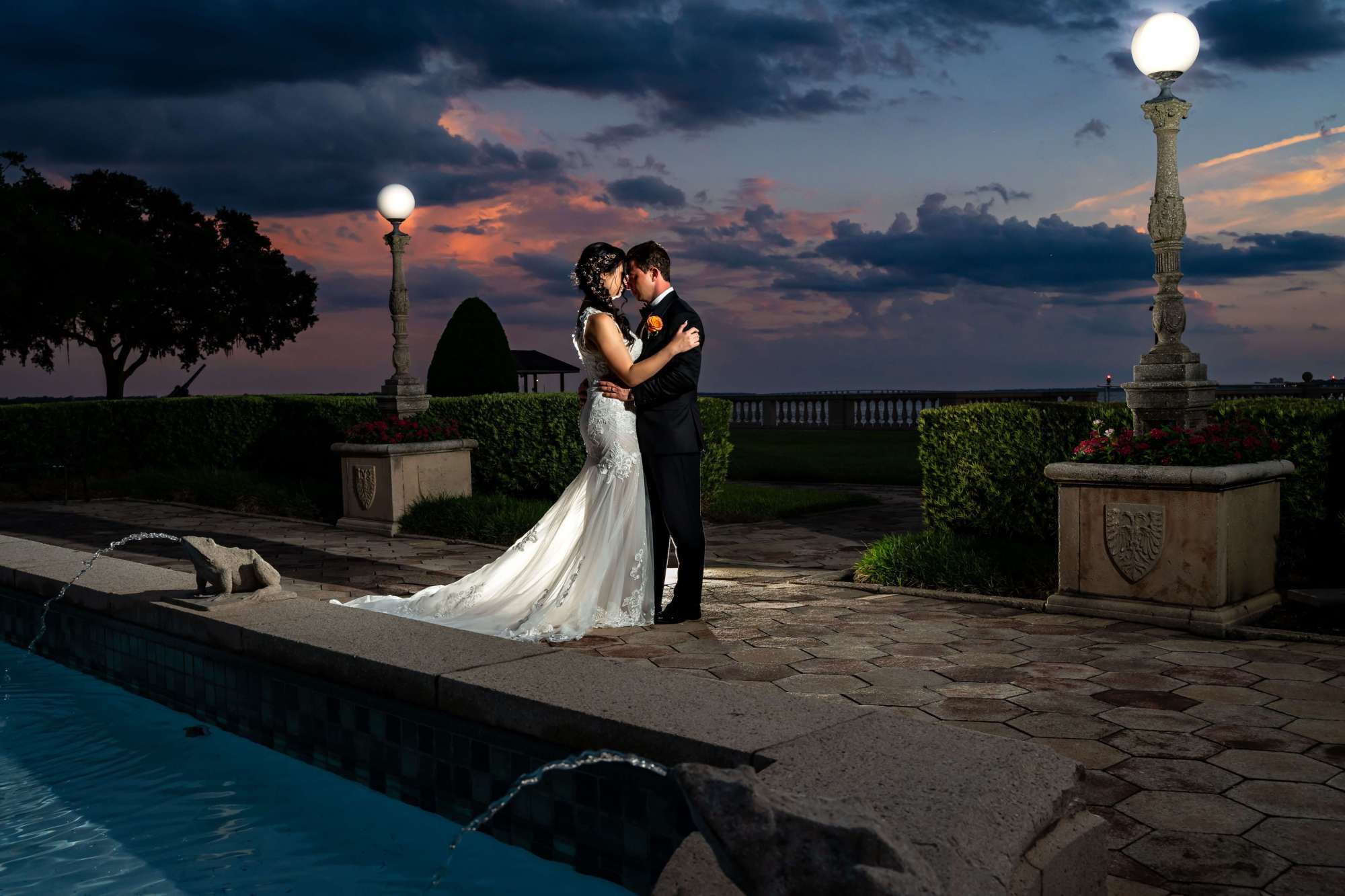 Bride and groom by the water at night in orida - Breathless Imagery and Premeier Bride Magazine Jacksonville