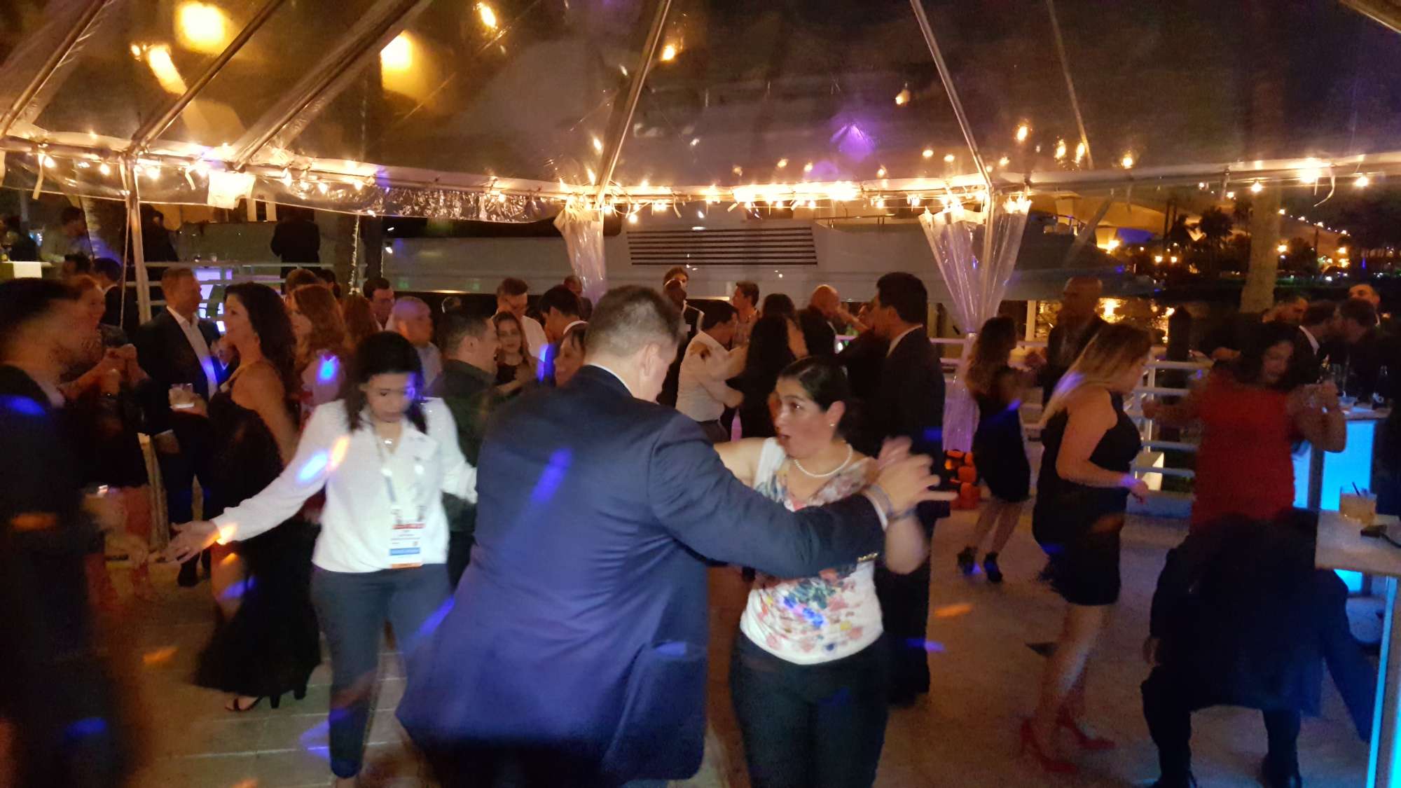 wedding guests dancing on the dance floor with Music by Vince - Premier Bride Jacksonville