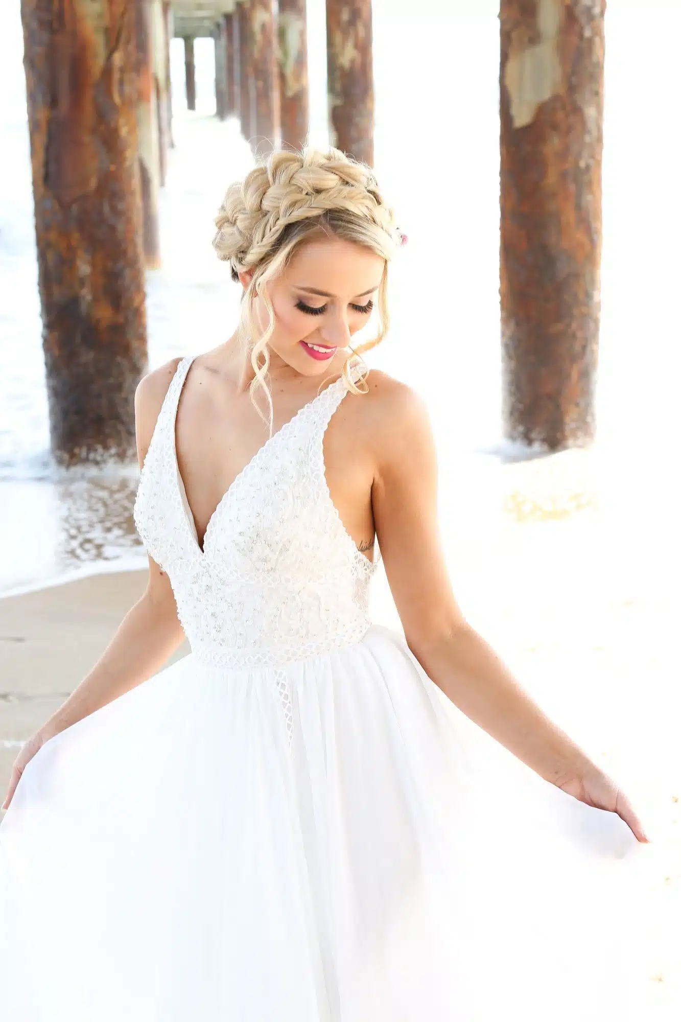 beach bride under the pier becphotography Premier Bride beach bride under the pier becphotography Premier Bride