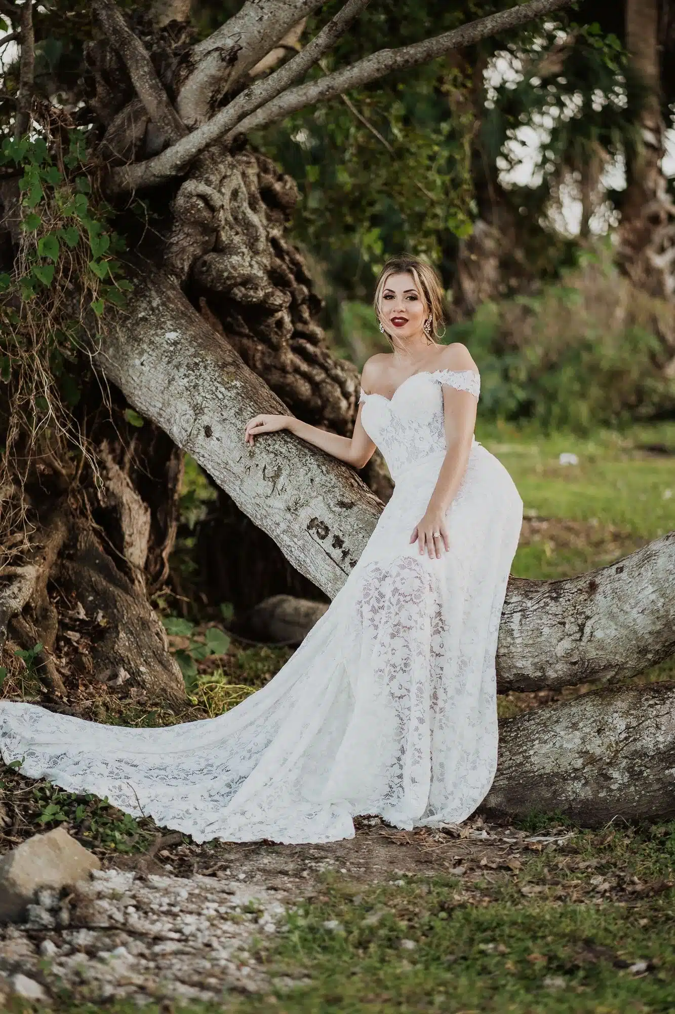 Palm Coast Bride by an uprooted tree NS Photobook Weddings Palm Coast Bride by an uprooted tree NS Photobook Weddings