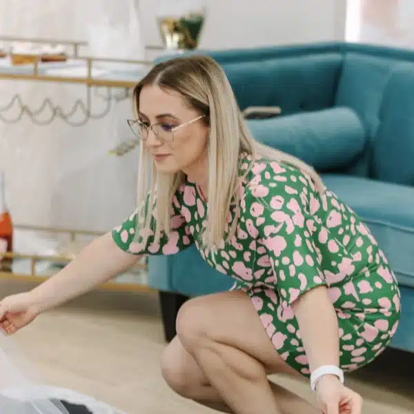 Wedding gown consultant helping a bride find the perfect dress
